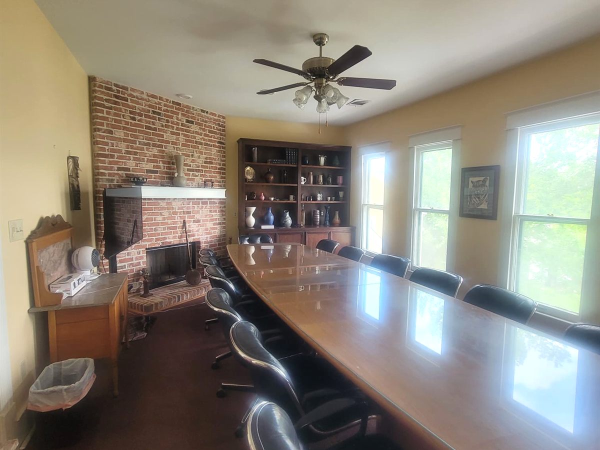 Conference room with long meeting table