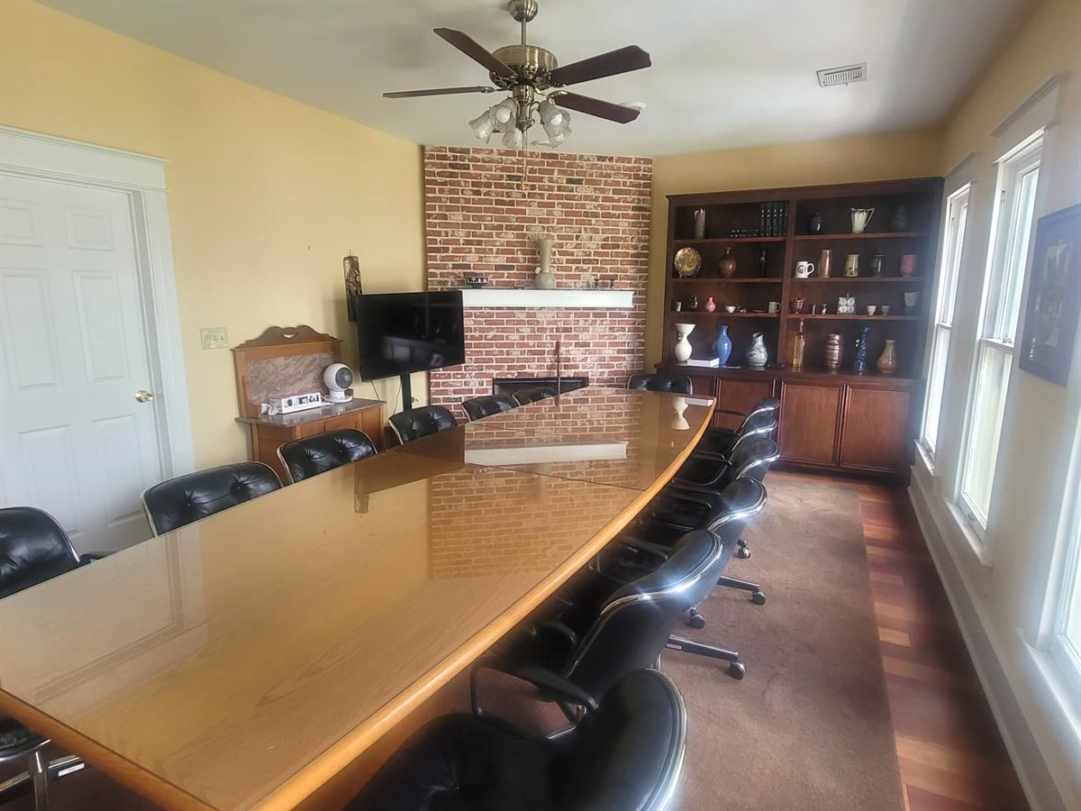 Conference Room Main with long meeting table